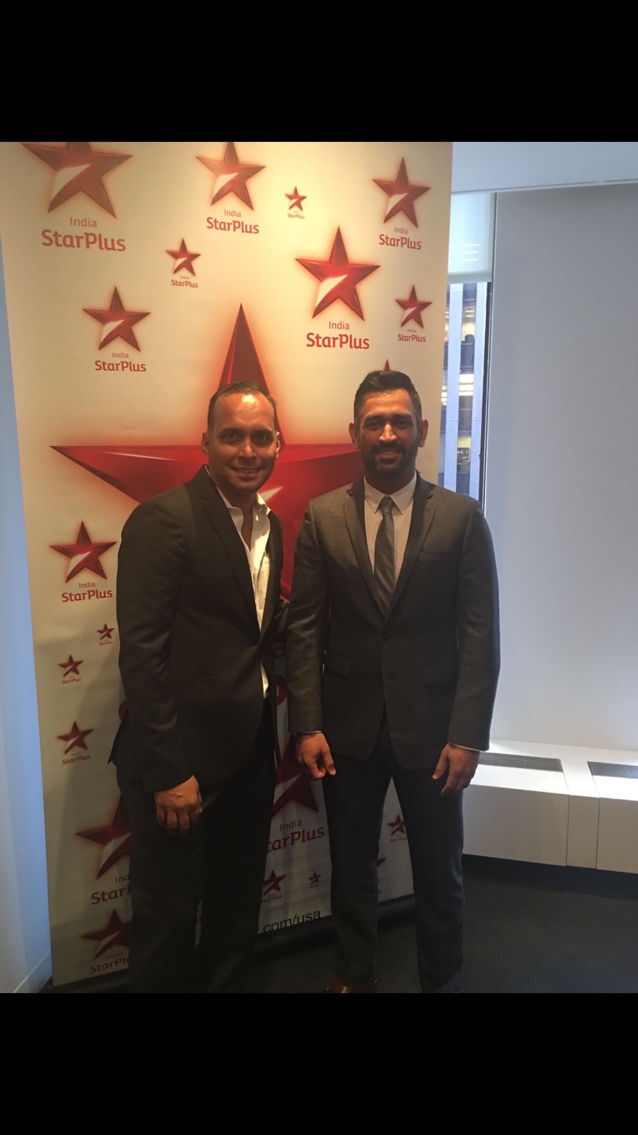 Kevin Rego with MS Dhoni