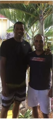Kevin Rego with cricketer Chris Gayle