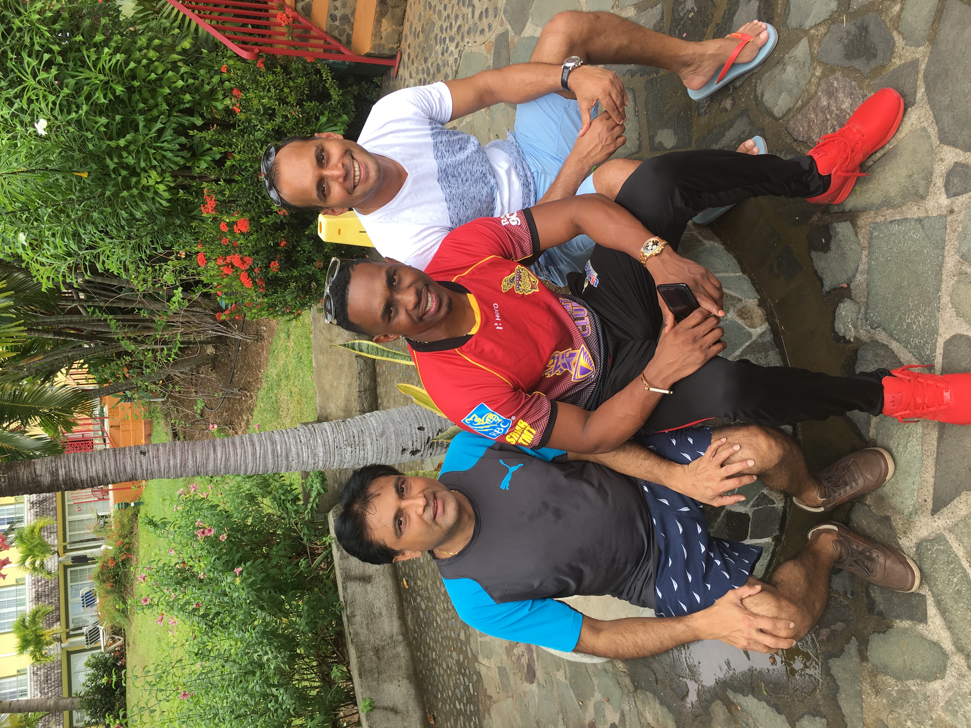 Kevin Rego with Dwayne Bravo and another guest