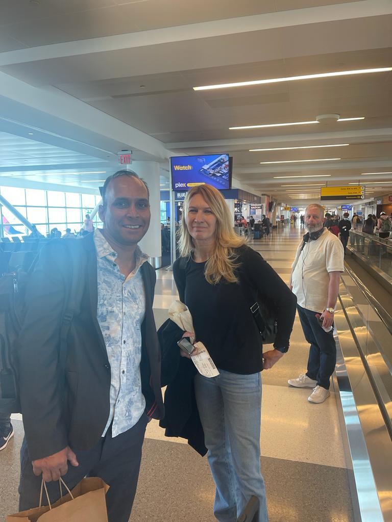 Kevin Rego with Steffi Graf at an airport